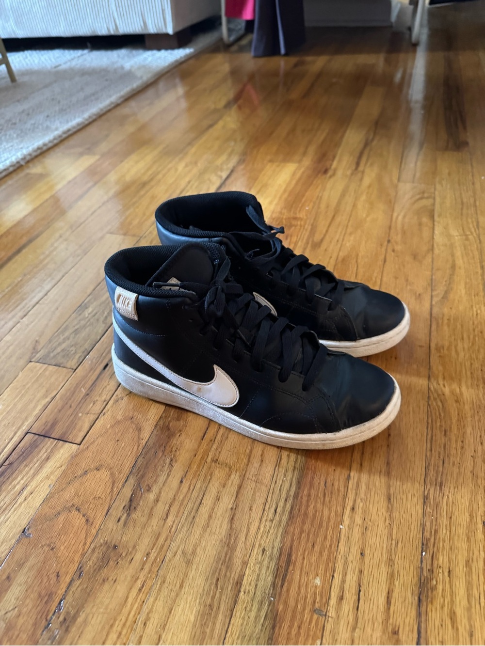Nike Black High-Top Sneakers with White Swoosh